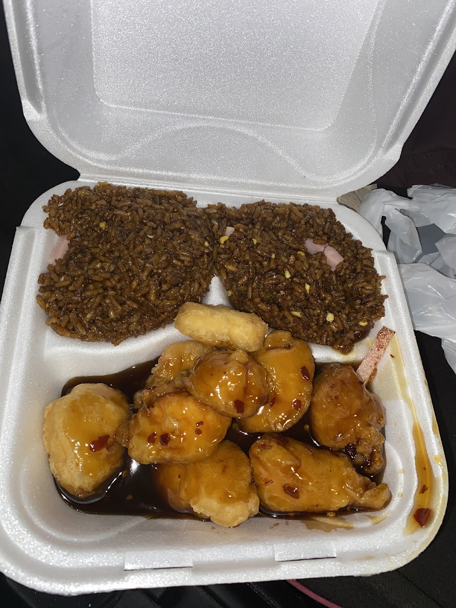 Combo box with fried rice and sweet and spicy chicken
